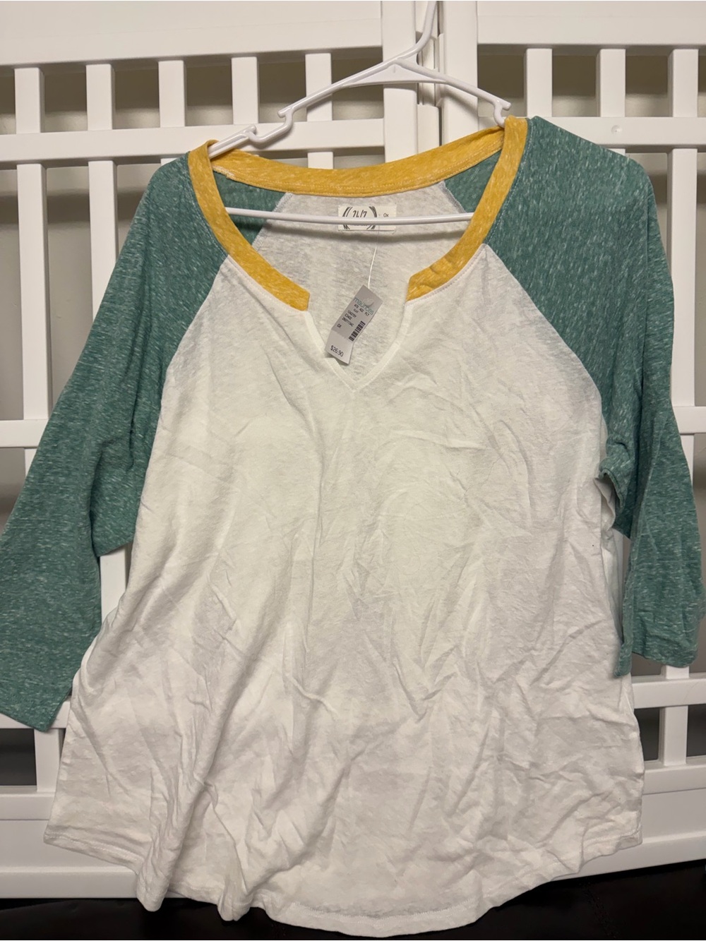 Maurices White Raglan V-Neck Top with Teal Sleeves and Yellow Trim